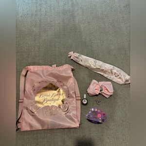 Bibbidi Bobbidi, boo boutique experience Pink Drawstring Bag with Accessories